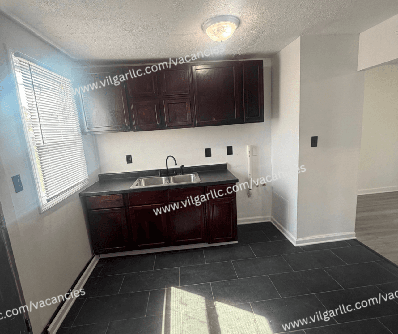 Gary House: 5121 E 10th Ave