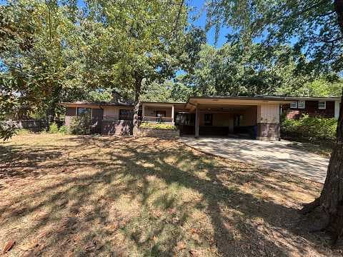 Favetteville House: 1054 N. Eva Ave.