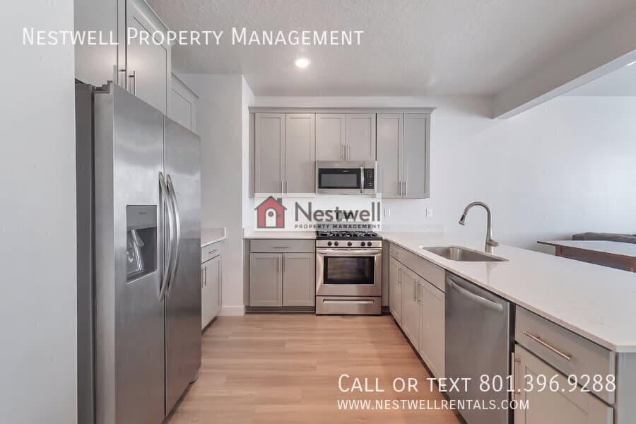Riverton Townhome: 15538 S Democracy Dr