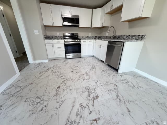 Syracuse House: 1310 Marilyn Dr