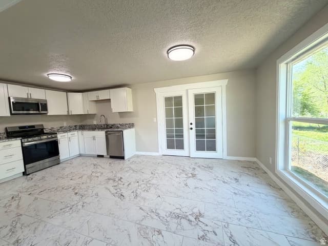 Syracuse House: 1310 Marilyn Dr
