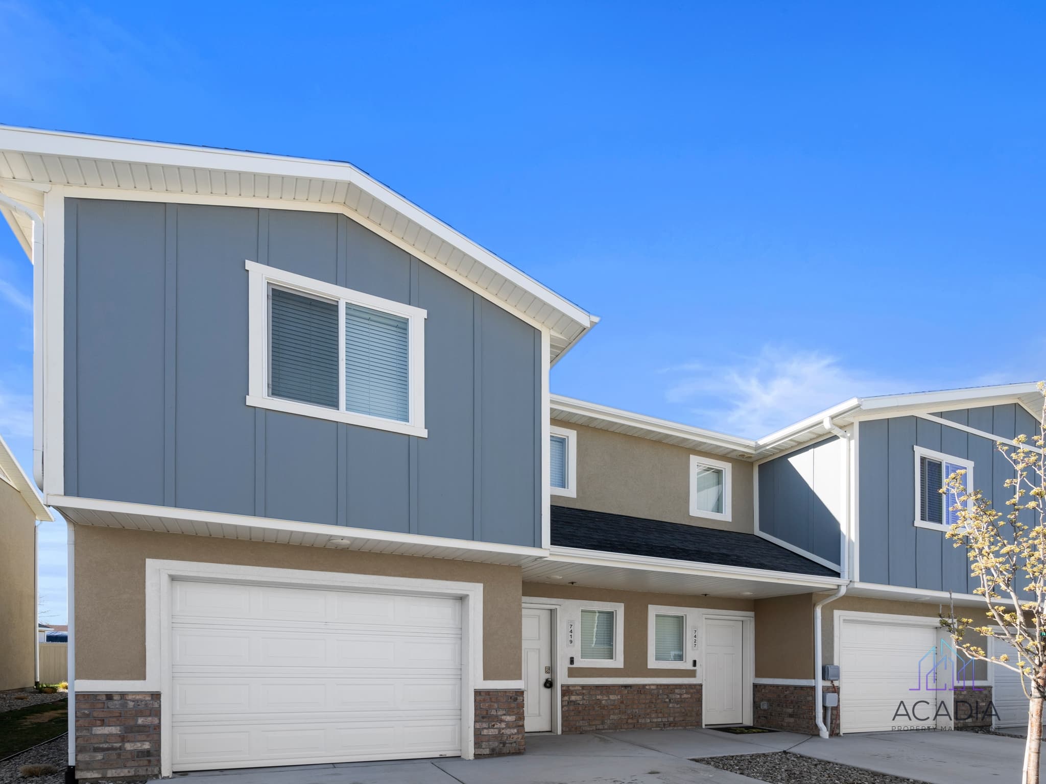Magna Townhome: 7427 W Laxey St