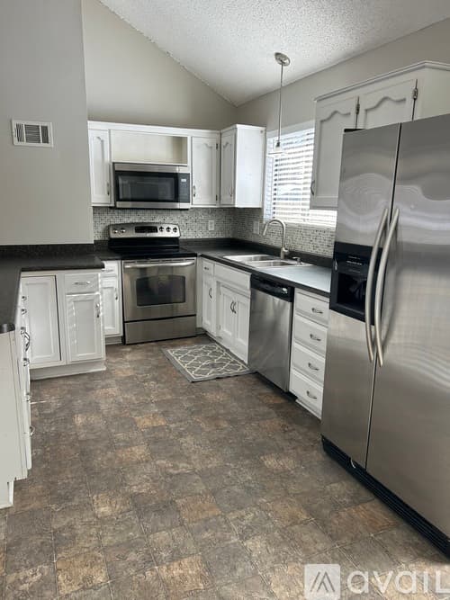 Mission Townhome: 6329 West 50th Street