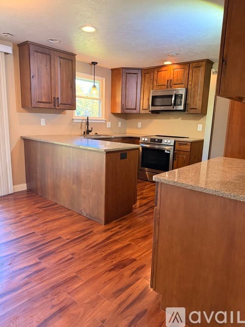Mapleton House: 9925 West Buckhaven Court