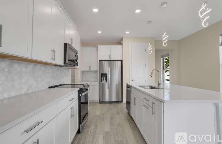 Wellington Townhome: Escue St