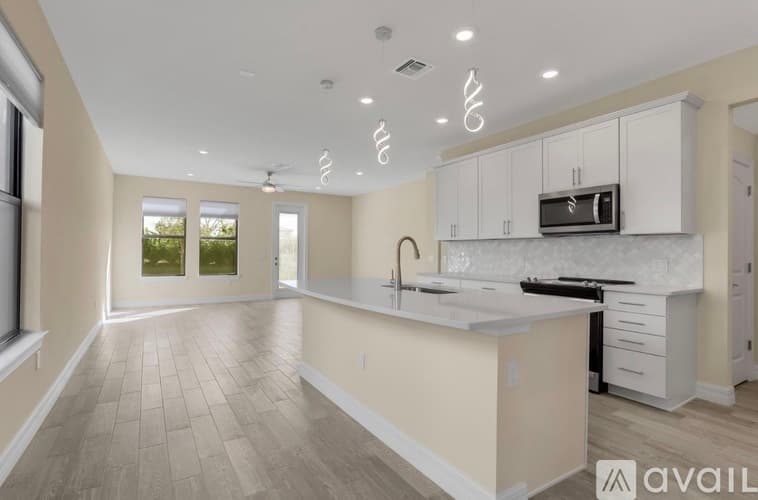 Wellington Townhome: Escue St