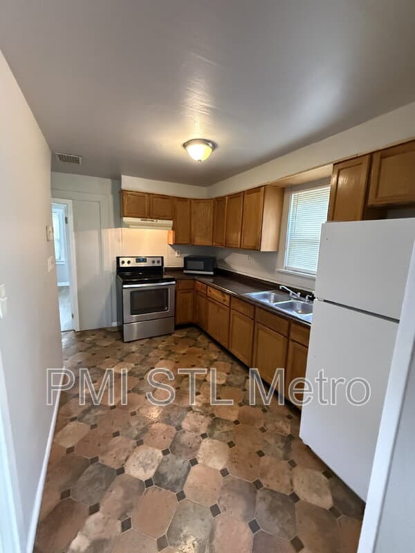 Saint Louis House: 6170 Emerald Avenue