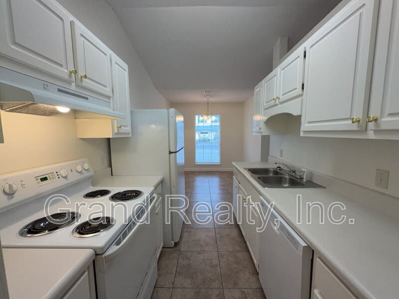 Milton House: 6299 Cottage Woods Dr