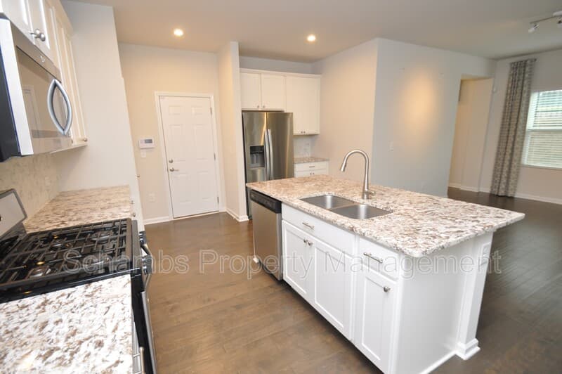 Apex Townhome: 1107 Doe Blossom Ln