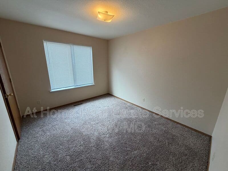 Ozark Condo: 739 E Bain