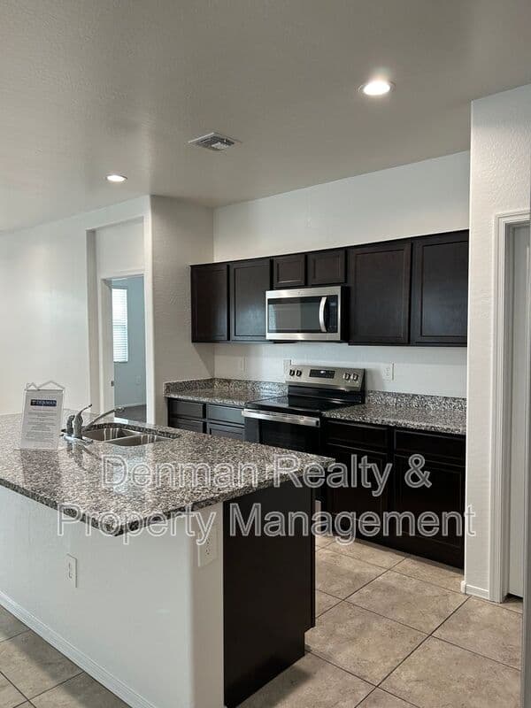 Surprise House: 18351 W. Artemisa Avenue