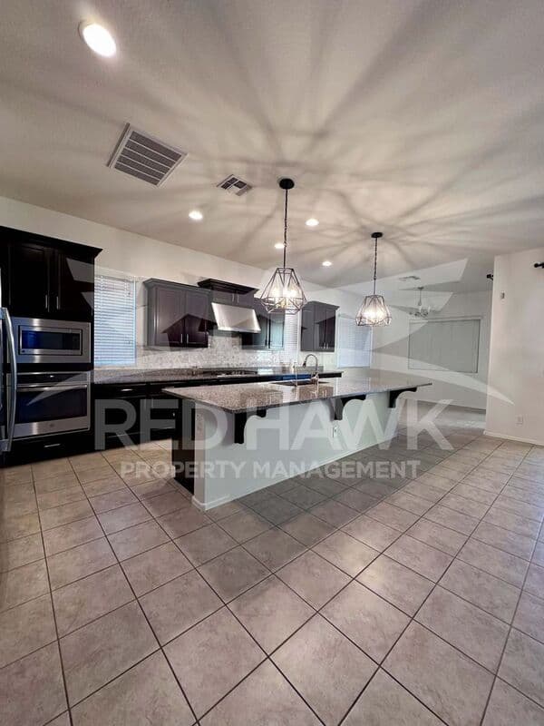 Gilbert House: 991 E Holland Park Dr