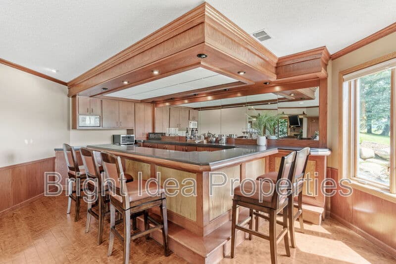 Plymouth House: 6210 Deerwood Circle North