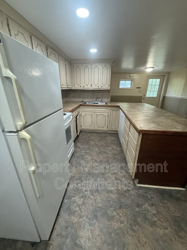 Sheffield Condo: 2804 East 18th Avenue