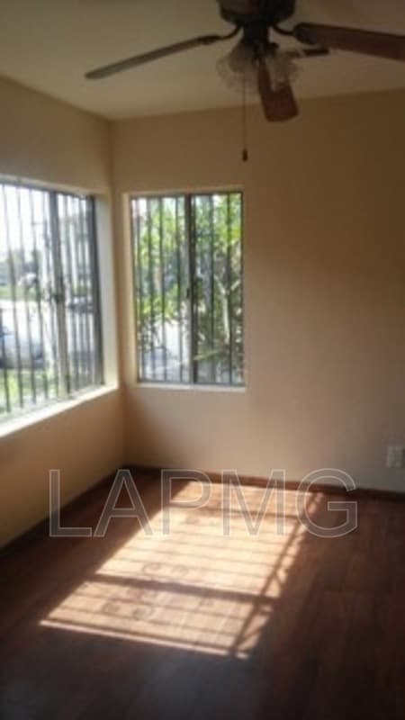 East Los Angeles House: 6165 E Olympic Blvd