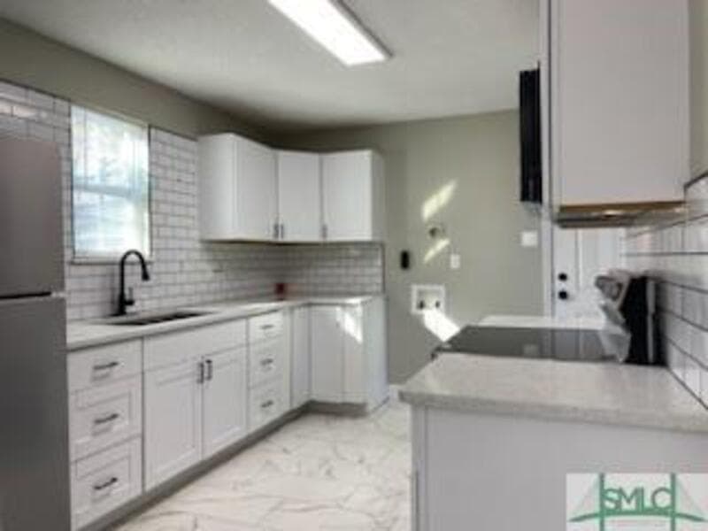 Savannah Condo: 1000 West 53rd Street - Lower Unit