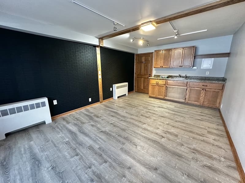 West Bend House: 143 North 6th Ave. - Comm