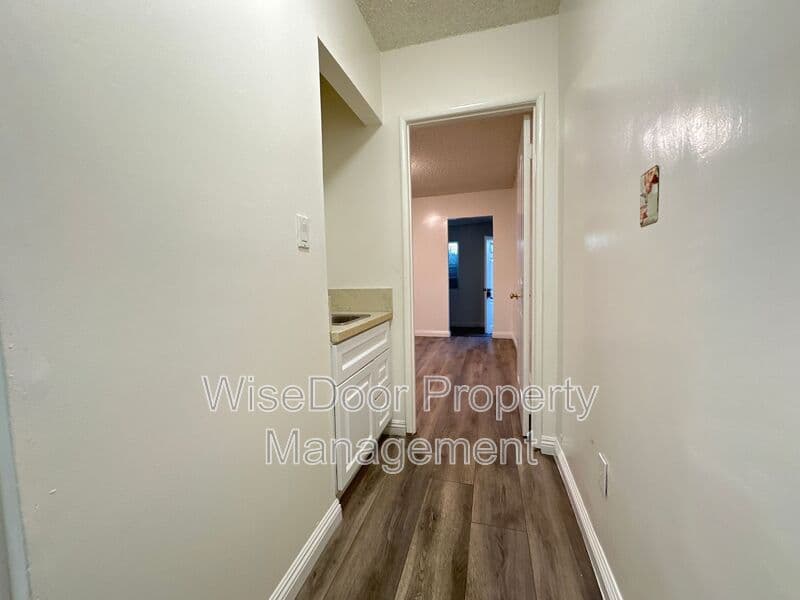 Bell Condo: 6205 Alamo Ave.