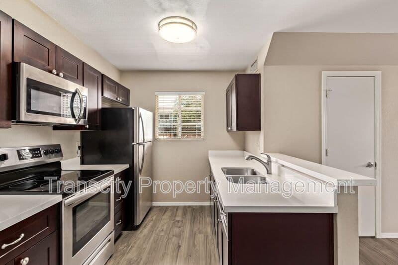 Mesa House: 2301 E University Dr