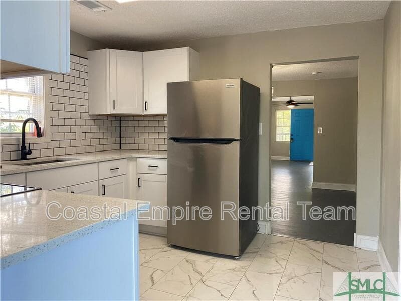 Savannah Condo: 1000 West 53rd Street - Lower Unit