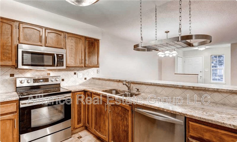 Aurora Townhome: 10015 East Mexico Avenue - 1
