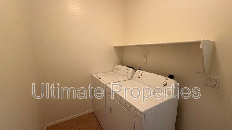 Peoria House: 7041 West Downspell Drive