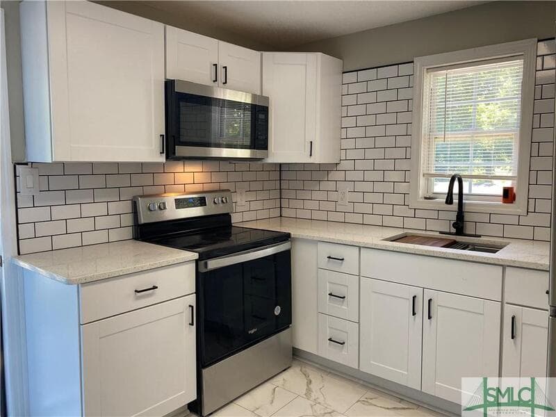 Savannah Condo: 1000 West 53rd Street - Lower Unit
