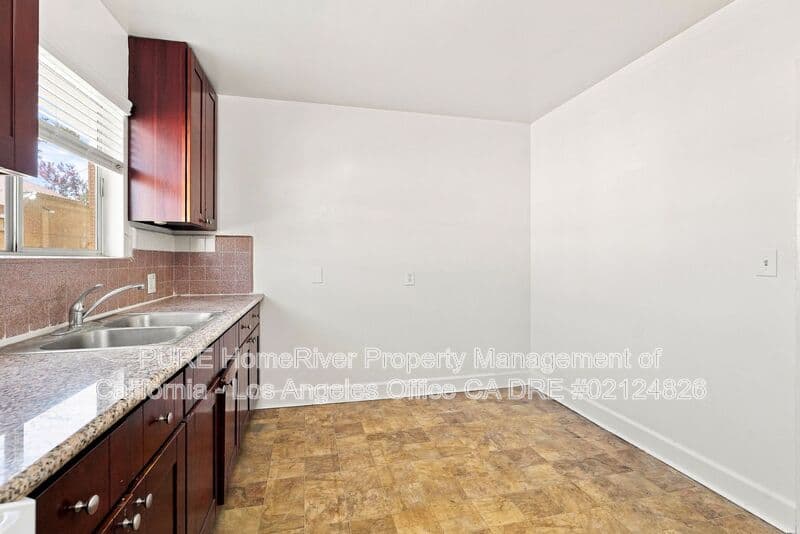 Gardena House: 1433 W 145th Street