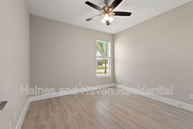 Poinciana House: 302 Elderberry Ct