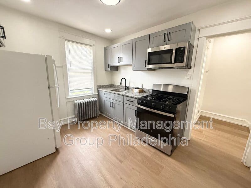 East Lansdowne Condo: 171 Lewis Ave