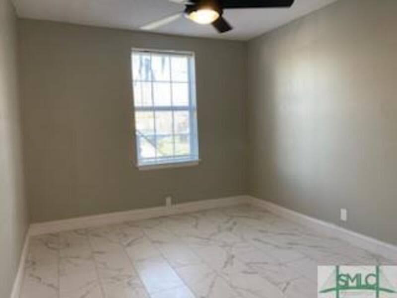 Savannah Condo: 1000 West 53rd Street - Lower Unit