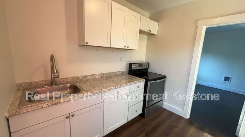 Homestead Condo: 122 E. 16th Ave