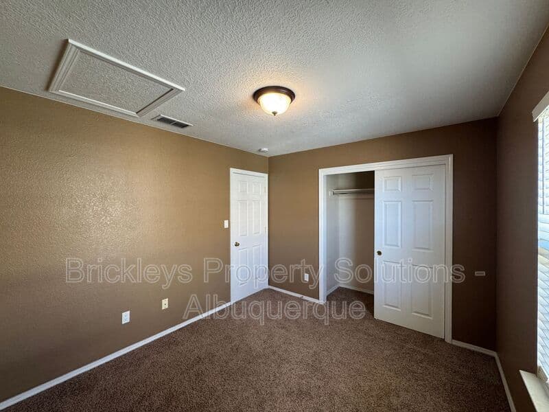 Albuquerque House: 7131 Wild Olive Ave NE