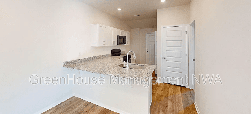 Unit B
Siloam Springs House: 412 W Cloud Dr