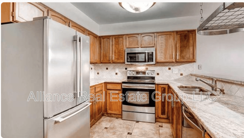 Aurora Townhome: 10015 East Mexico Avenue - 1