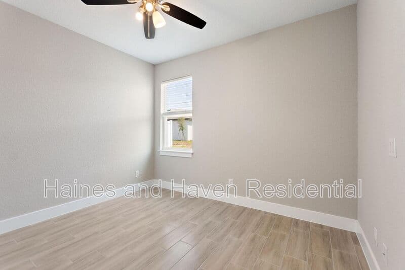 Poinciana House: 302 Elderberry Ct