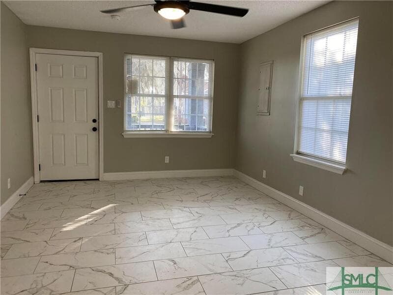 Savannah Condo: 1000 West 53rd Street - Lower Unit