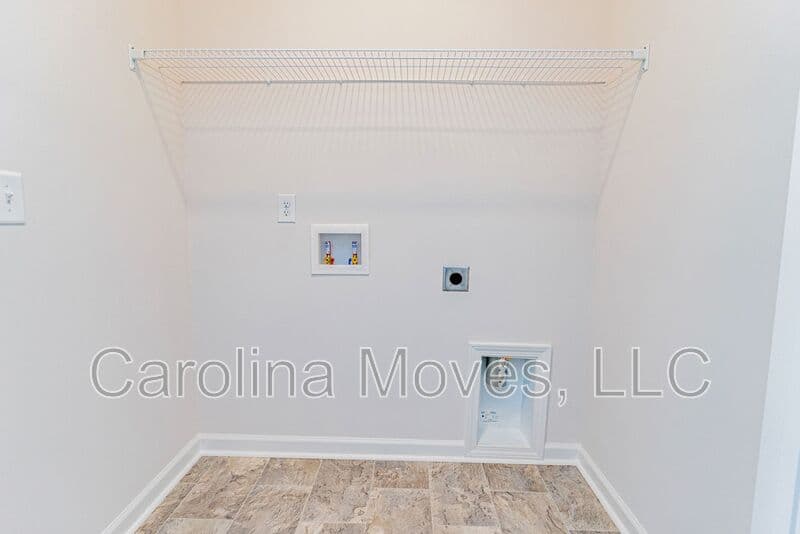Anderson Townhome: 117 Village Main