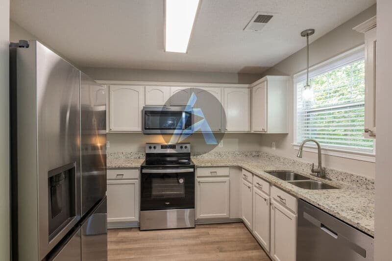 Woodstock Townhome: 437 Red Coat Ln