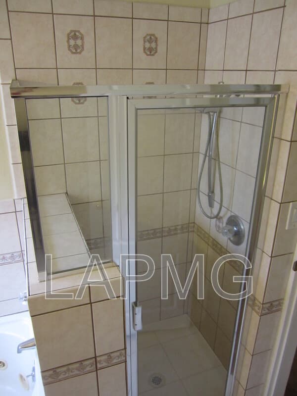 East Los Angeles House: 6165 E Olympic Blvd