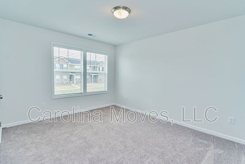 Anderson Townhome: 117 Village Main