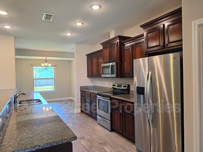 Milton House: 8839 Longmont Way