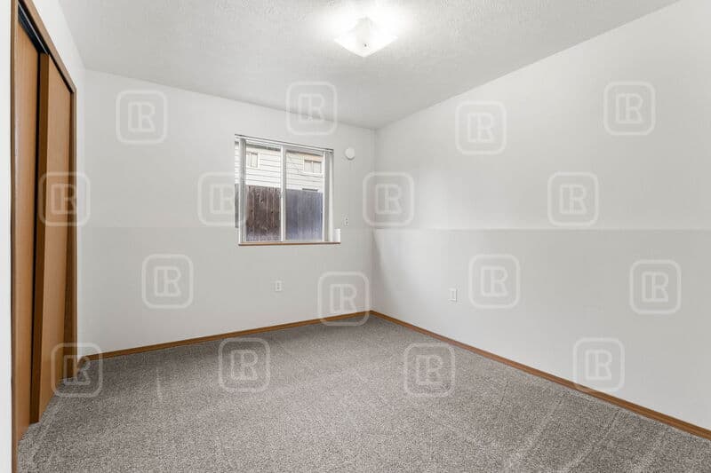 Cheney Condo: 107 West 3rd Street - 1