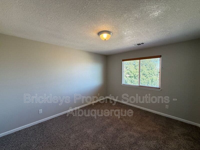 Rio Rancho House: 418 Paseo Roja Pl NE