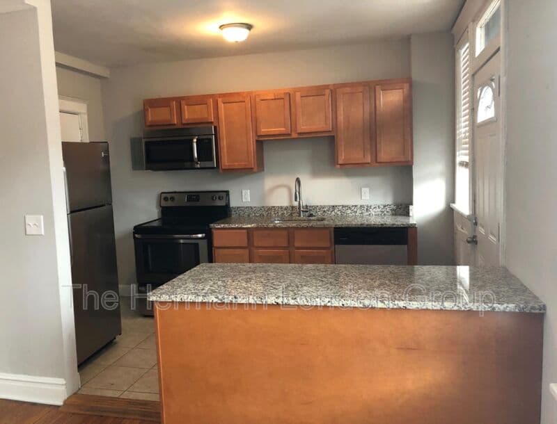 Saint Louis Condo: 3300-3308 Russell Blvd