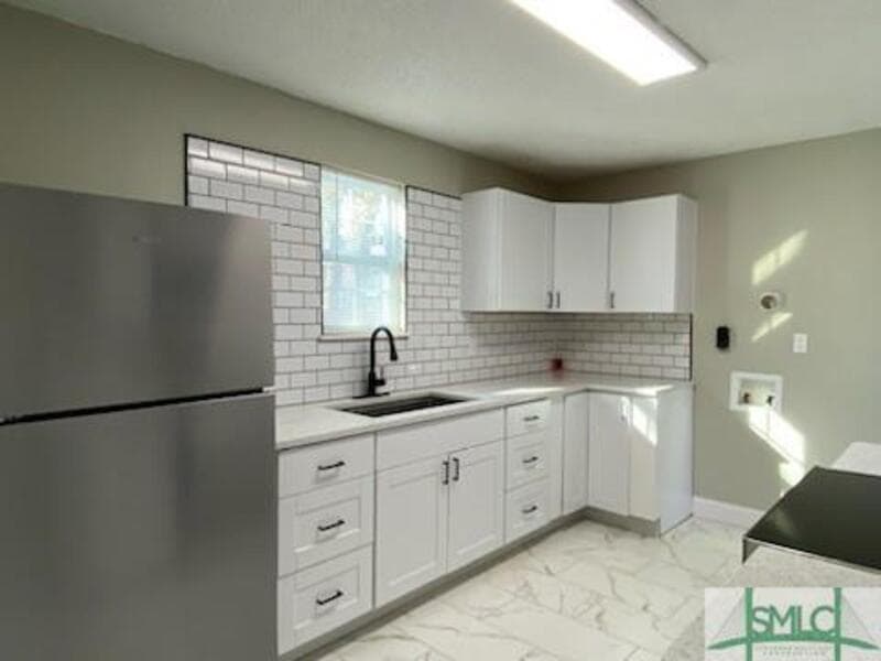 Savannah Condo: 1000 West 53rd Street - Lower Unit