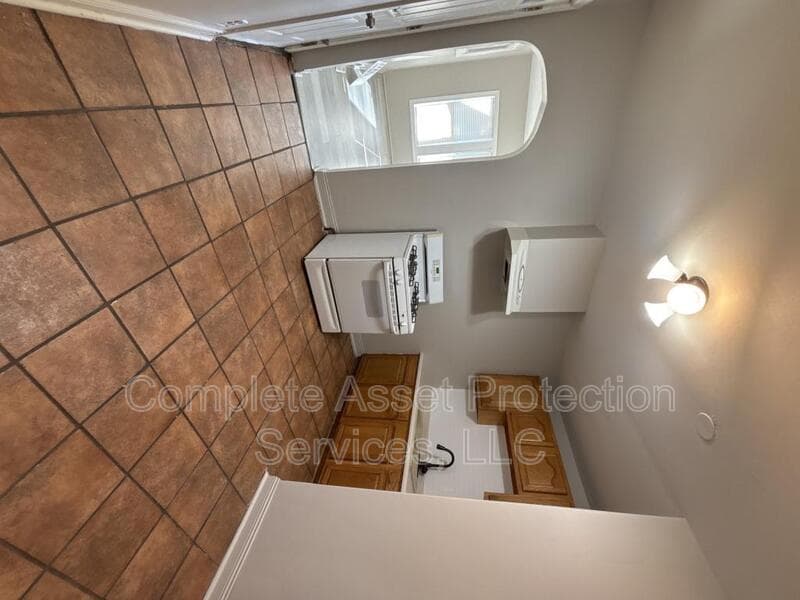 Hammond Condo: 1119 Wilcox St