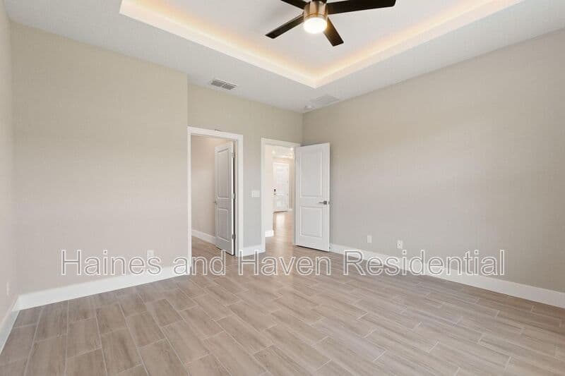 Poinciana House: 302 Elderberry Ct