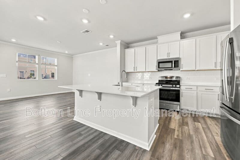 Durham Townhome: 5811 Woodlawn Dr