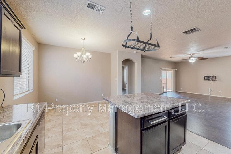 Albuquerque House: 8323 Mock Heather Road Northwest